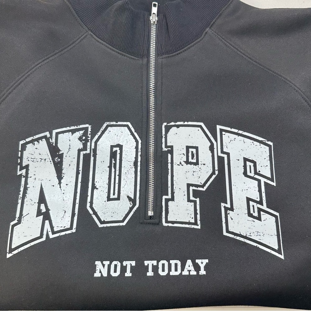 New 1/4 zip 100% polyester.